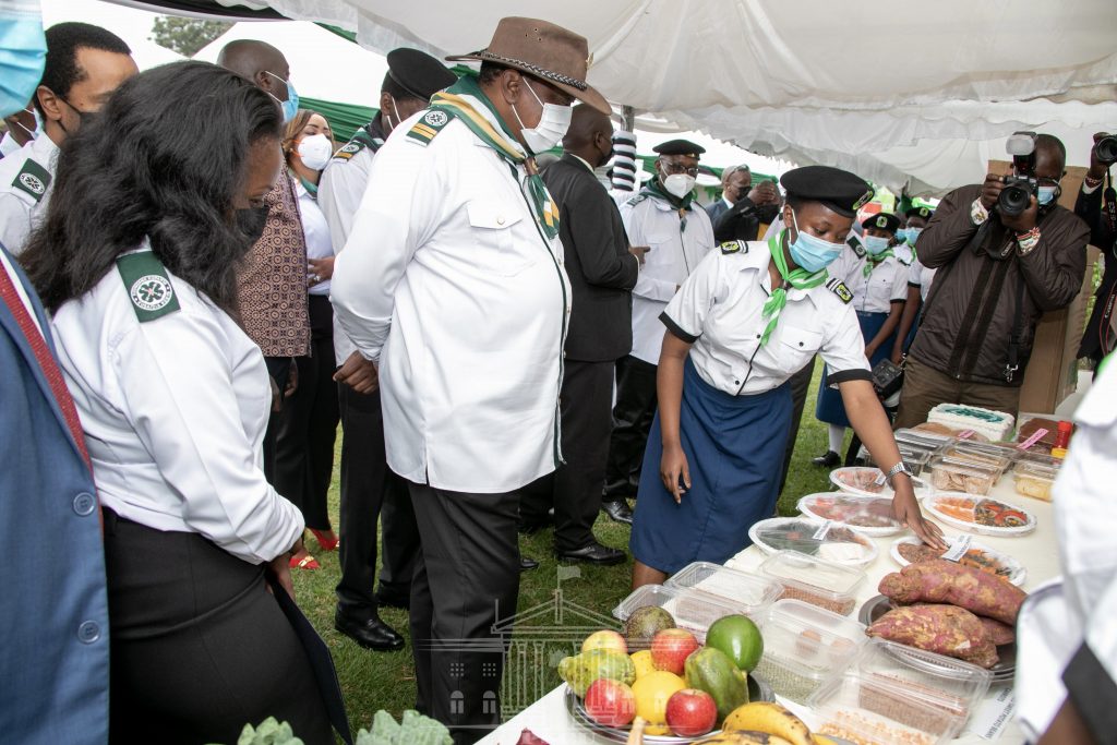 President tours various demonstration stands by 4-K Clubs, Young Farmers Clubs and ENABLE Kenya beneficiaries during official launch of 4-K Clubs and ENABLE Kenya Program